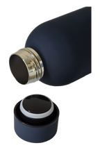 The navy bottle with its cap off, showing the polished stainless steel mouth and the sealed screw cap