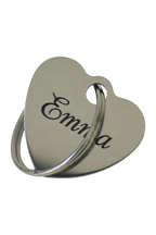 Example of the engraving: the stainless steel keyring, heart, laser-marked with a name in a flowing script, dark against the polished steel